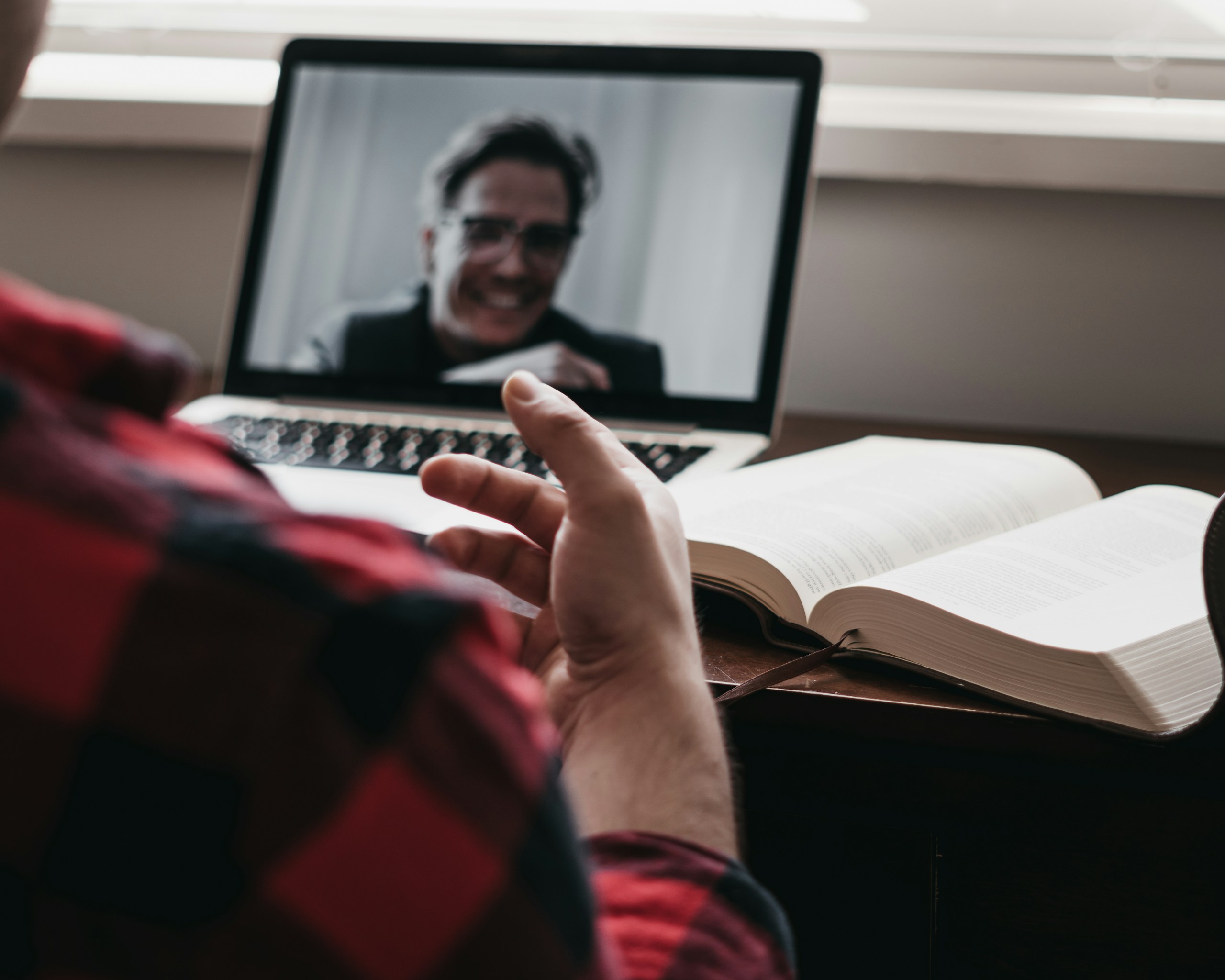 Online Video Call with Bible on Table
